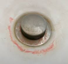 What Are The Pink Stains In My Shower, Sink And Toilet?